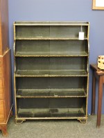 Lot 527 - A Regency style painted wood waterfall bookcase