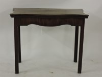 Lot 529 - A George III mahogany fold over tea table