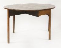 Lot 505 - A George III yew wood drop-leaf table