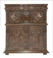 Lot 416 - An oak panelled and moulded chest