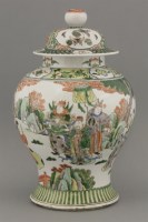 Lot 476 - A famille verte baluster vase and a cover