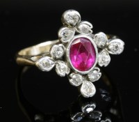 Lot 435 - A synthetic ruby and diamond lozenge-shaped cluster ring