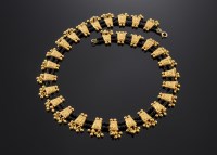 Lot 529 - An Indian high carat gold two-row black glass bead necklace