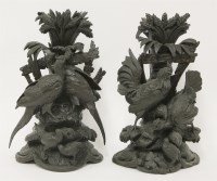 Lot 90 - A pair of Black Forest wood carvings