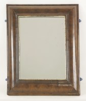 Lot 386 - A William and Mary oyster veneered cushion frame wall mirror