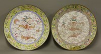 Lot 180 - A pair of famille rose Canton enamel circular Saucer Dishes
