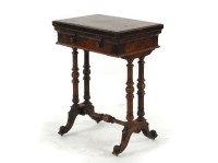 Lot 531 - A Victorian burr walnut games table