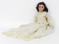 Lot 410 - A Bisque head doll