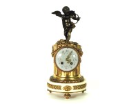 Lot 552 - A gilt metal and marble mantel clock