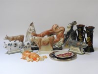 Lot 1153 - A collection of eight Rye pottery figures