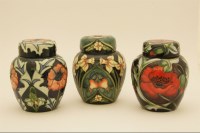 Lot 1208 - Three Moorcroft ginger jars and covers