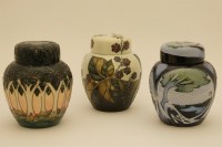 Lot 1213 - Three various Moorcroft ginger jars and covers