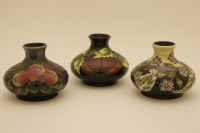 Lot 1214 - Three Moorcroft squat vases