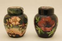 Lot 1216 - Two Moorcroft ginger jars and covers