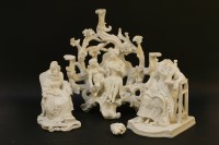 Lot 1319 - A bisque porcelain figural group of Cupid and Phyce within a bower