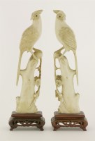 Lot 169 - A pair of ivory carvings