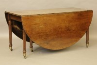 Lot 491 - A George III mahogany drop leaf table