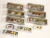 Lot 205 - A collection of six box Cararama die cast Minis