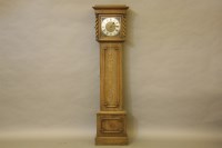 Lot 386 - Oak long case clock