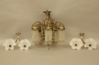 Lot 391 - A brass chandelier and a pair of wall lights