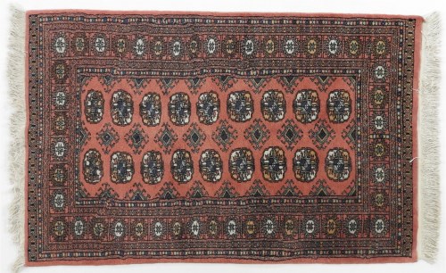 Lot 589 - Persian design bokhara rug