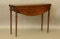 Lot 544 - A Regency drop flap table