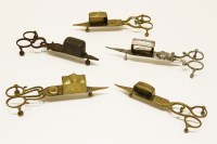 Lot 133 - A group of five snuffers to include a late 18th century pair
