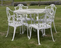 Lot 1059 - A cast aluminium garden table