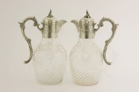 Lot 405 - A pair of German silver-mounted cut-glass claret jugs