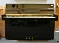Lot 417 - Iron frame ebonised piano