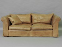 Lot 444 - A Heals brown leather sofa