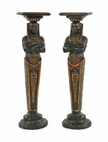 Lot 397 - A pair of painted and parcel gilt plaster pedestals