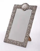 Lot 130 - A silver dressing table mirror