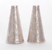 Lot 133 - A pair of silver salt and pepper shakers