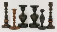 Lot 88 - Two pairs of treen candlesticks