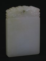Lot 180 - A white jade 'Ping An Wu Shi' Pendant