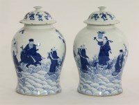 Lot 51 - A pair of blue and white baluster Jars and Covers
