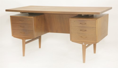 Lot 591 - A Danish teak desk