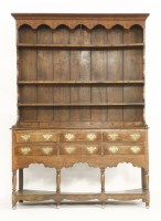 Lot 436 - An oak pot board dresser