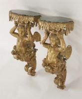 Lot 501 - A pair of French giltwood wall brackets