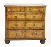 Lot 572 - A walnut chest of drawers