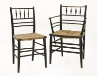 Lot 581 - An ebonised William Morris Sussex elbow chair