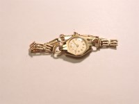 Lot 75 - A ladies 9ct gold Rome mechanical watch