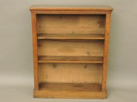 Lot 631 - An oak open bookcase