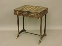 Lot 681 - A 19th century Chinese lacquer games table