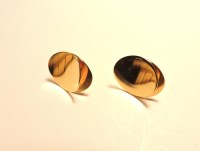Lot 187 - A pair of Italian gold oval disc style stud earrings