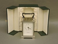 Lot 498 - A silver plated David Paterson mechanical carriage clock