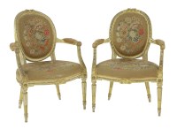 Lot 397 - A pair of Louis XV style beechwood elbow chairs