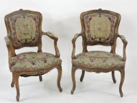 Lot 434 - A pair of Louis XV-style elbow chairs