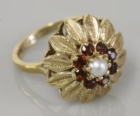 Lot 2 - A 9ct gold cultured pearl and garnet cluster ring